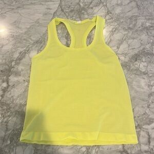 Electric lemon swirly tank